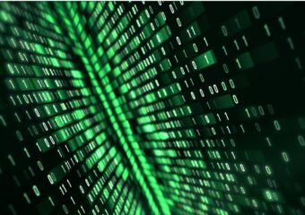 Digitally generated image of green binary code appearing at angle as it moves toward a centralized column of data in the background.