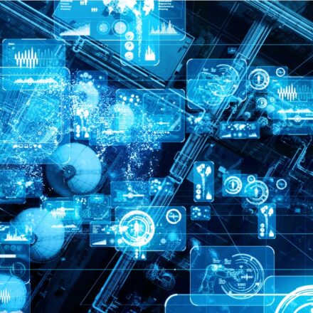 Digitally generated image representing 5G communications network at a modern manufacturing plant, tinted in lighter and darker shades of blue.