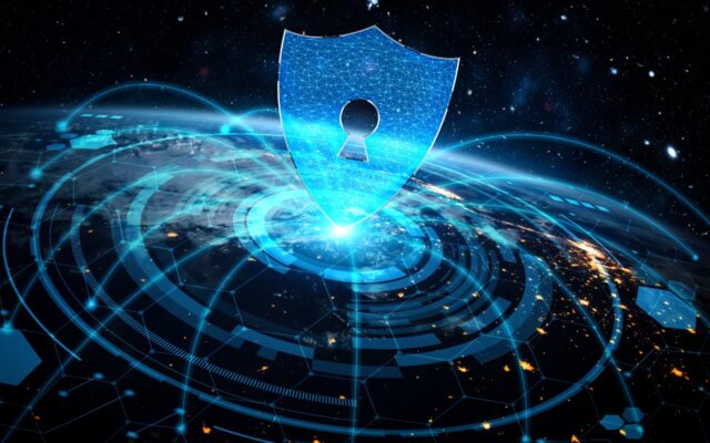 Digital image of a security lock symbol and protective shield over the globe.