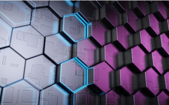 Digitally generated image of hexagons, gray on the left and purple on the right. Two gray hexagons in the center are outlined in a blue light on their edges.