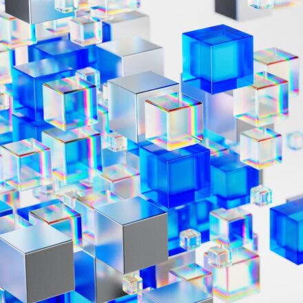 Digital image of silver, gray, white, and blue cubes appearing against a white background.