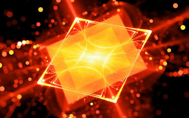 Digital rendering of an orange colored processor with red outlines against a dark background, representative of futuristic quantum computing.