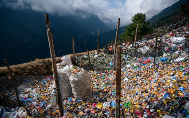 Trash accumulated near Syangboche Namche Bazaar, Nepal along the route to Mount Everest Base Camp. Photo courtesy of Martin Edstrom.